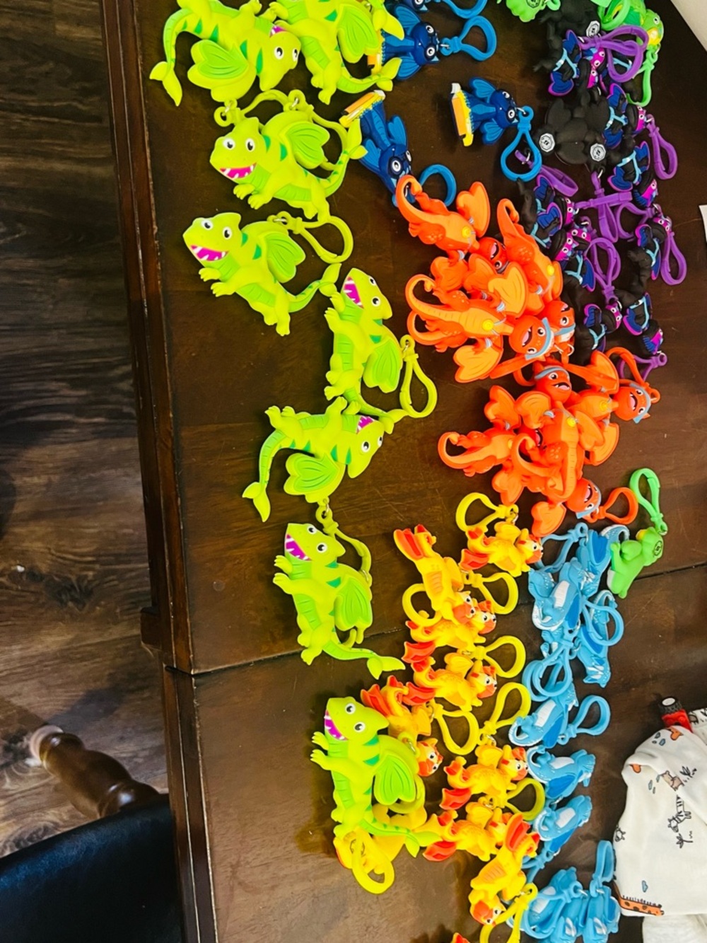 Colorful Silicone Dinosaur Keychain Toy - Green, Orange, Yellow, Blue around 80